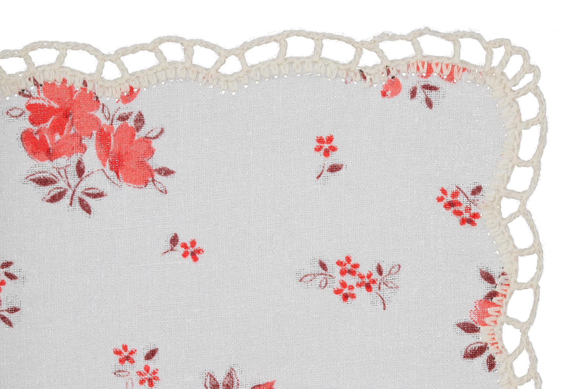 Hand-stitched floral patch in studio light