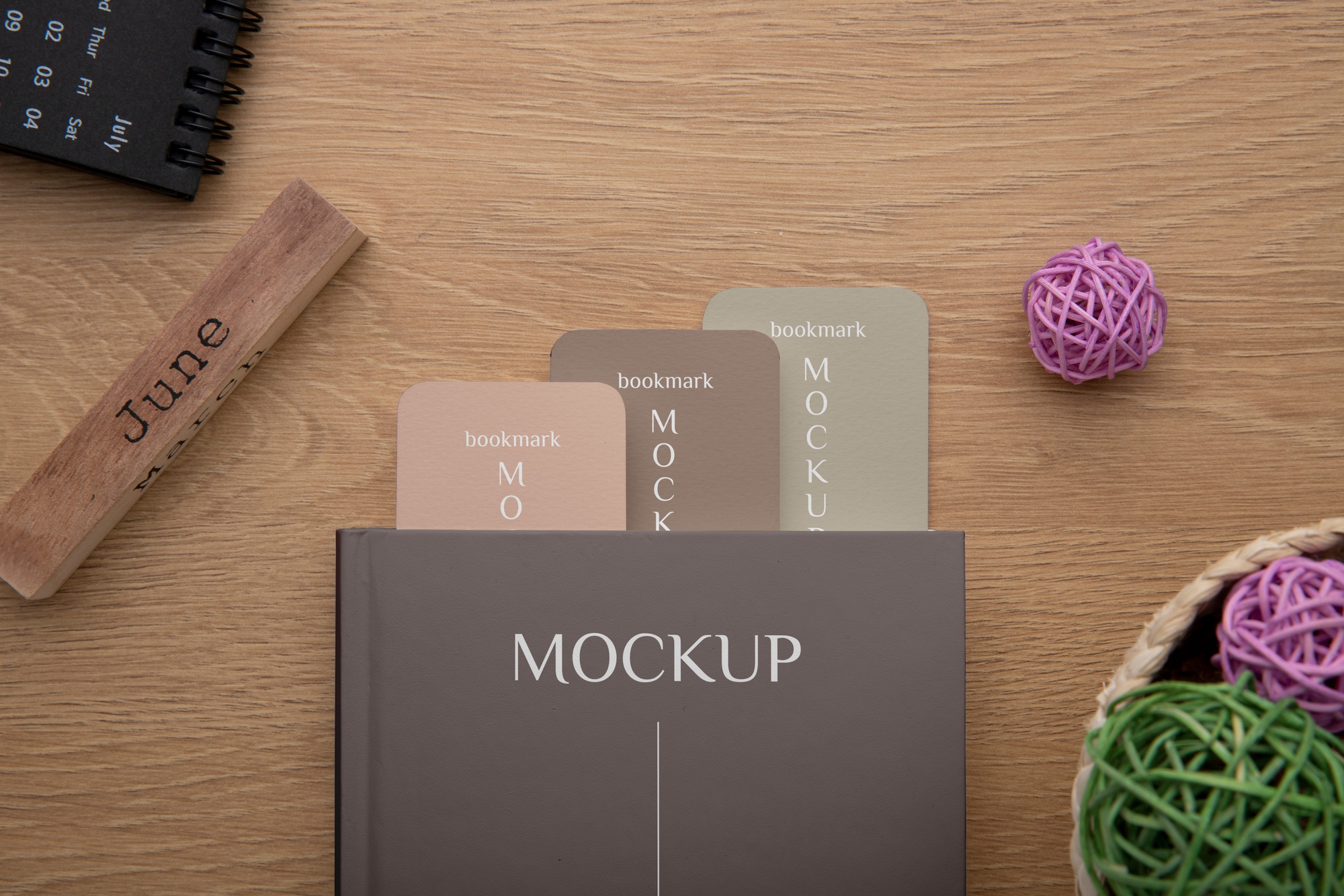 Set of embroidered sample cards arranged on table